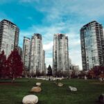 gray city buildings under cloudy sky