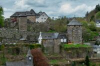 a castle like building with a clock tower on top of it