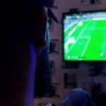 man watching soccer game