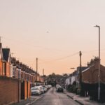 cars parked on side of the road during daytime