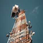 white and red ferris wheel under blue sky during daytime